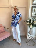 Load image into Gallery viewer, Slinky Cross Over Long Top - Blue/White - Wardrobe By Simone