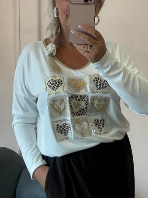 Soft knit v-neck leopard hearts top - White - Wardrobe By Simone