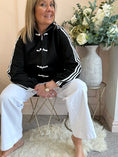 Load image into Gallery viewer, Sporty Vibe Zip & Toggle Jacket - Black/White - Wardrobe By Simone
