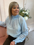 Load image into Gallery viewer, Ruffle Neck Top  - Pastel Blue - Wardrobe By Simone
