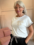 Load image into Gallery viewer, Crochet Bow T Shirt  - White/Cream - Wardrobe By Simone
